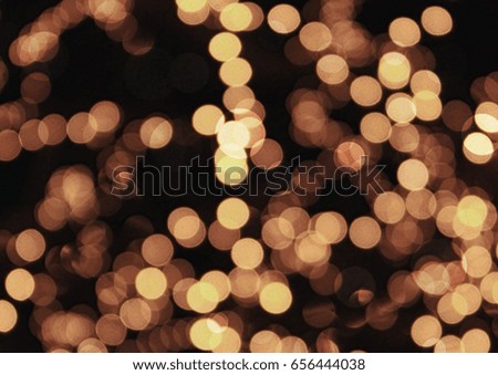 The golden bokeh glittering bright abstract background