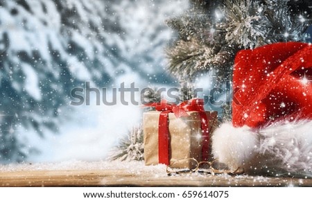 Winter Christmas background with Santas hat