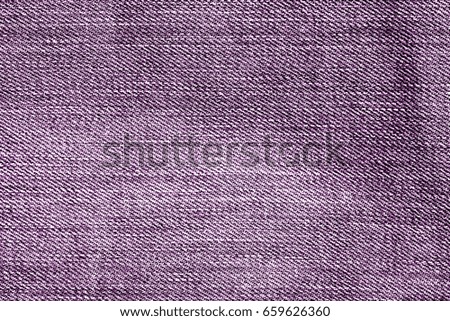 Purple color weathered jeans pattern. abstract background and texture for design