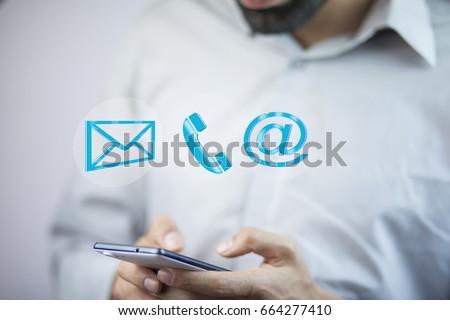 Businessman hand phone with  digital interface in screen
