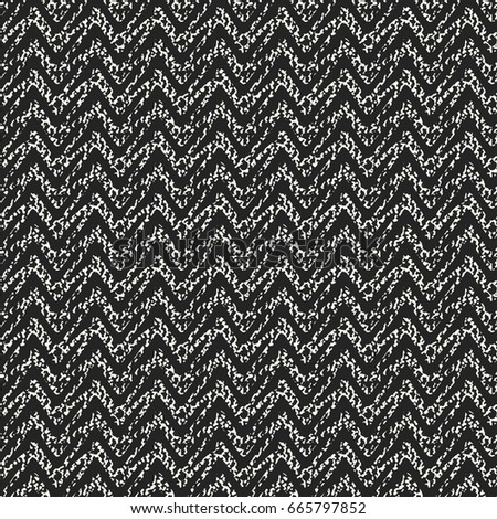Abstract mottled textured zigzag motif. Seamless pattern.