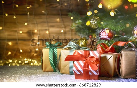 Christmas tree with gifts, rustic background