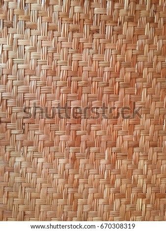 The surface of the bamboo is patterned for flooring.