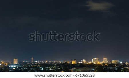 beautiful landscape city night with dramatic moody dark sky, point of view nightlife cityscape with town light