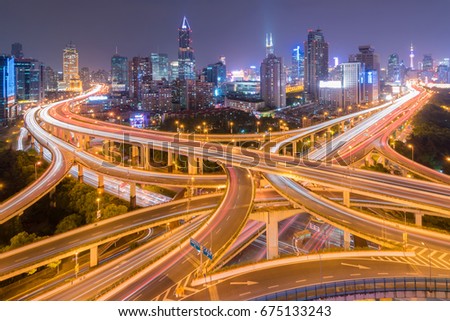 urban skyline and overpass at night in Shanghai