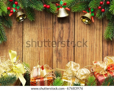 Christmas fir tree with christmas decoration on wooden board