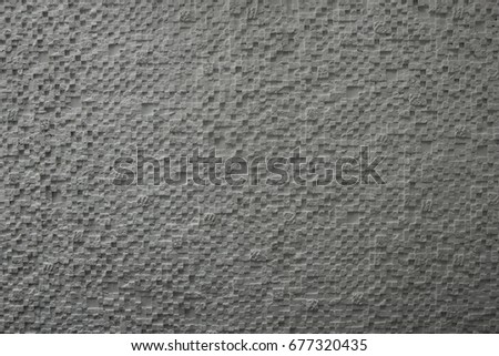 Background wall of small cubes in gray color