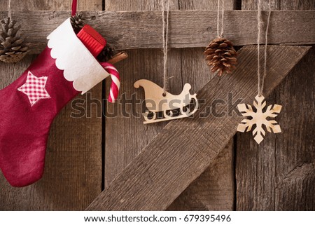 Christmas stockingwith gifts on  wooden wall