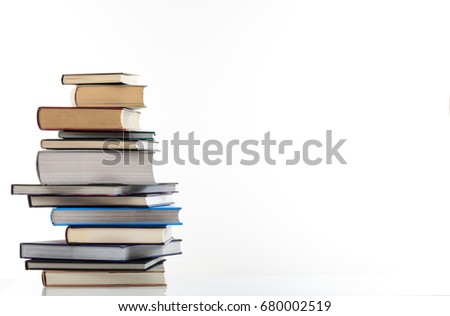 Education concept. Books stack isolated on white background - copy space