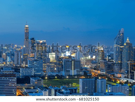 Aerial view of Bangkok modern office buildings, condominium, living place in big city downtown with sunset scenery, Bangkok is the most populated city in Southeast Asia.