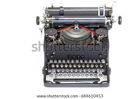 Portable old vintage typewriter isolated over white background
