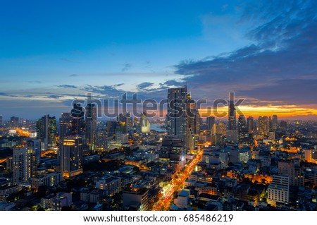 View of Bangkok modern office buildings, condominium in Bangkok city downtown with sunset sky ,Bangkok is the most populated city in Southeast Asia. 