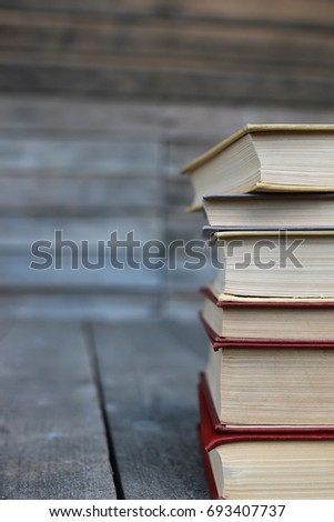 books standing on a table