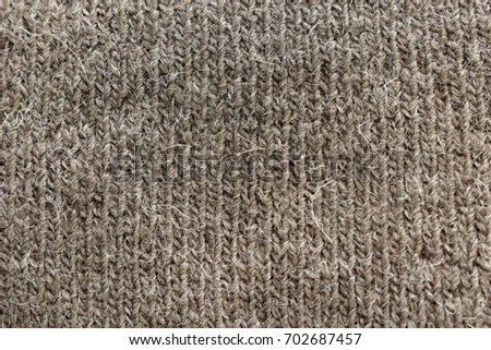 knitted fabric light brown color.textured background