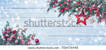 Christmas Decoration with Star and Snowflakes on Wooden Background