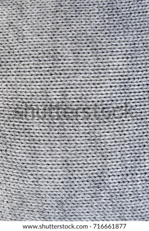 texture of gray knitted woolen fabric