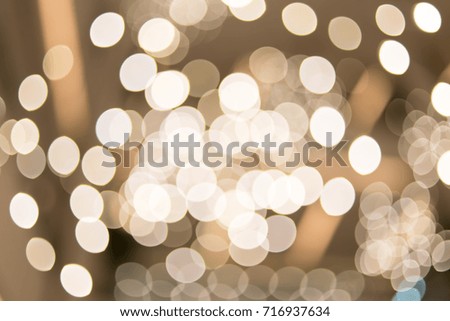 gold abstract burred background with bokeh defocused lights, snow, Christmas and new year theme background