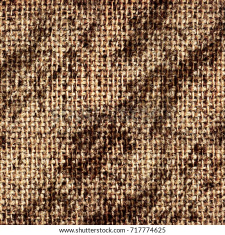 Texture of an old dirty burlap. Grunge background old fabrics in spots