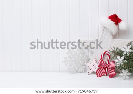Christmas decoration on a white wooden background.
