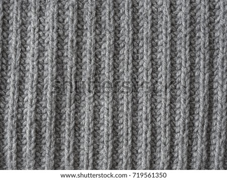 grey wool hand knitted texture abstract background