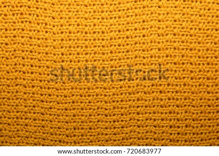The texture of the knitted fabric yellow
