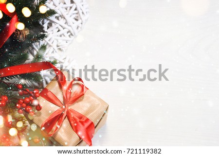 Christmas Gift Box On Wooden Background With Snowflakes, Greeting card Merry Christmas and Happy New Year