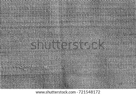 Natural gray background of thick red patterned fabric. Fabric texture  for background. 
