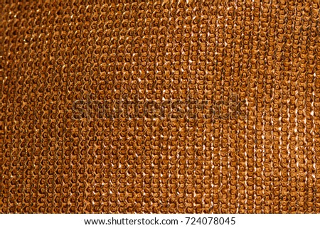 Texture of the chain mail. Gold weaving of chain mail