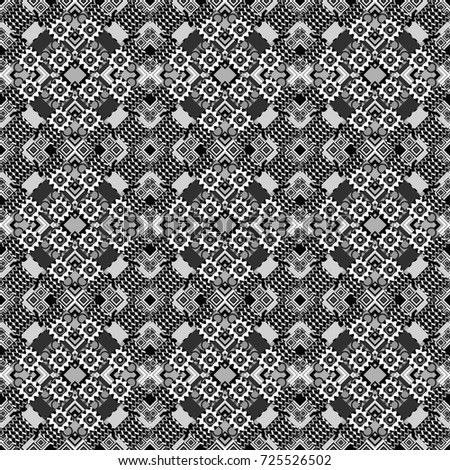 Abstract vintage pattern with decorative tiles pattern. Oriental style in gray, black and white colors. Seamless pattern in ethnic traditional style.