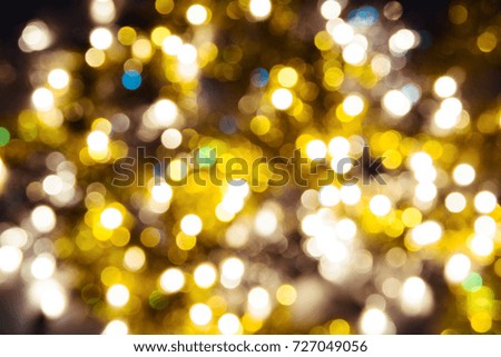 Christmas lights. Golden abstract background.