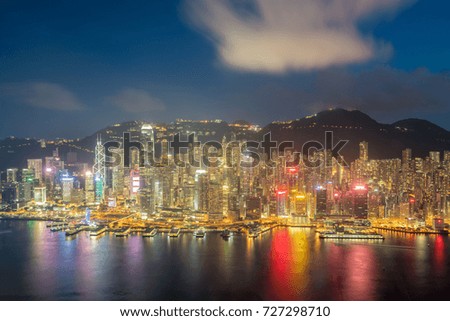 Hong Kong in Kowloon area skyline view from Victoria Peak in Hong Kong.