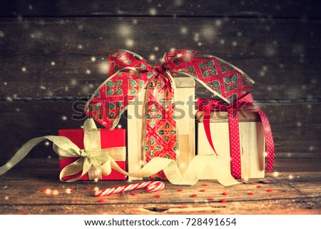 Christmas Gifts on wooden background