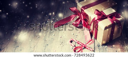 Christmas Gifts on wooden background