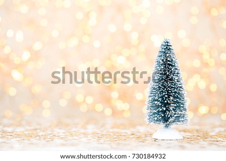 Christmas wooden decorations on a bokeh background.