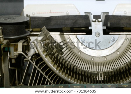 mechanisms of a printing unit of an old electric typewriter