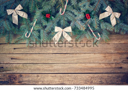 Christmas Garland on the Old Wooden Background 