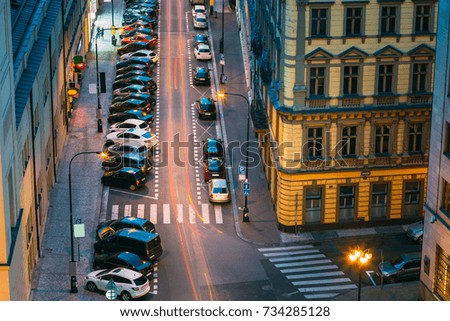 Prague, Czech Republic. Top View Of Traffic And Parked Cars On The Hybernska Street. Evening Or Night Illumination