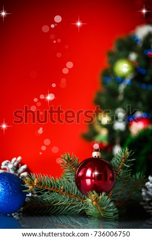 beautiful new year toys on an abstract red background