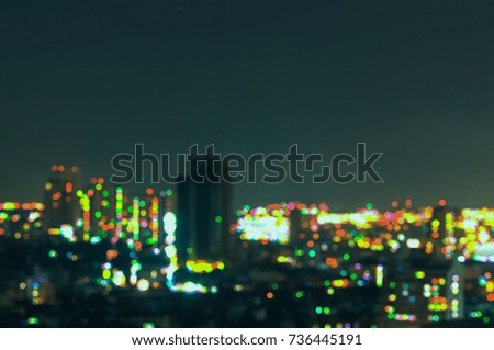 Blurry Bangkok night view with skyscraper in business district in Bangkok Thailand