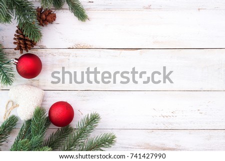 Christmas background - Christmas decorating elements and ornament rustic on white wood table with snowflake. Creative Flat layout and top view composition with border and copy space design.