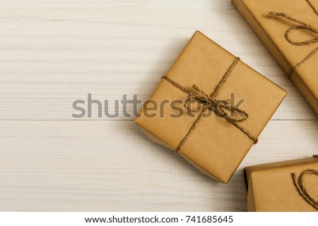 gift boxes package on white wooden background