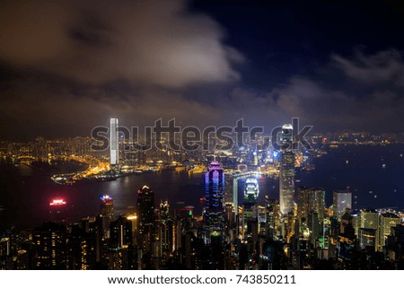 Hong Kong skyline cityscape, modern skyscraper building, view from the Peak at twilight dusk