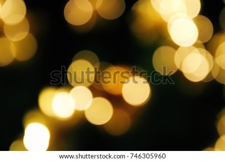 Yellow de focused christmas lights background