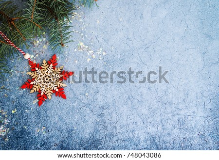 New Year / Christmas decorations with snowflake on blue background