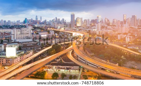 Highway intersection and city business downtown background day to night, cityscape background