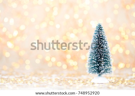 Christmas wooden decorations on a bokeh background.
