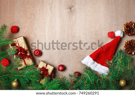 Christmas winter background, a table decorated with fir branches and decorations. Happy New Year. Merry Christmas.