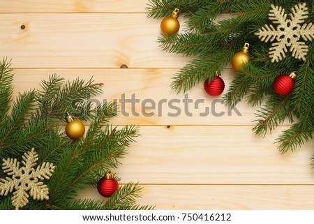 Christmas background. Top view with copy space. fir tree on light wooden background