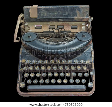 Old typewriter on black background cipping path