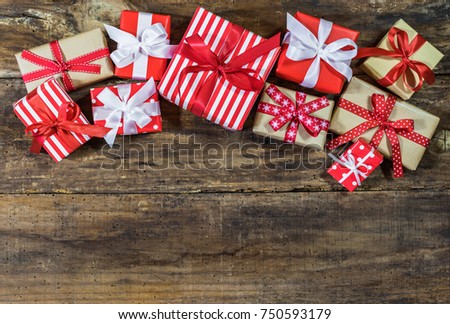 Many Christmas gifts on wooden background with copy space